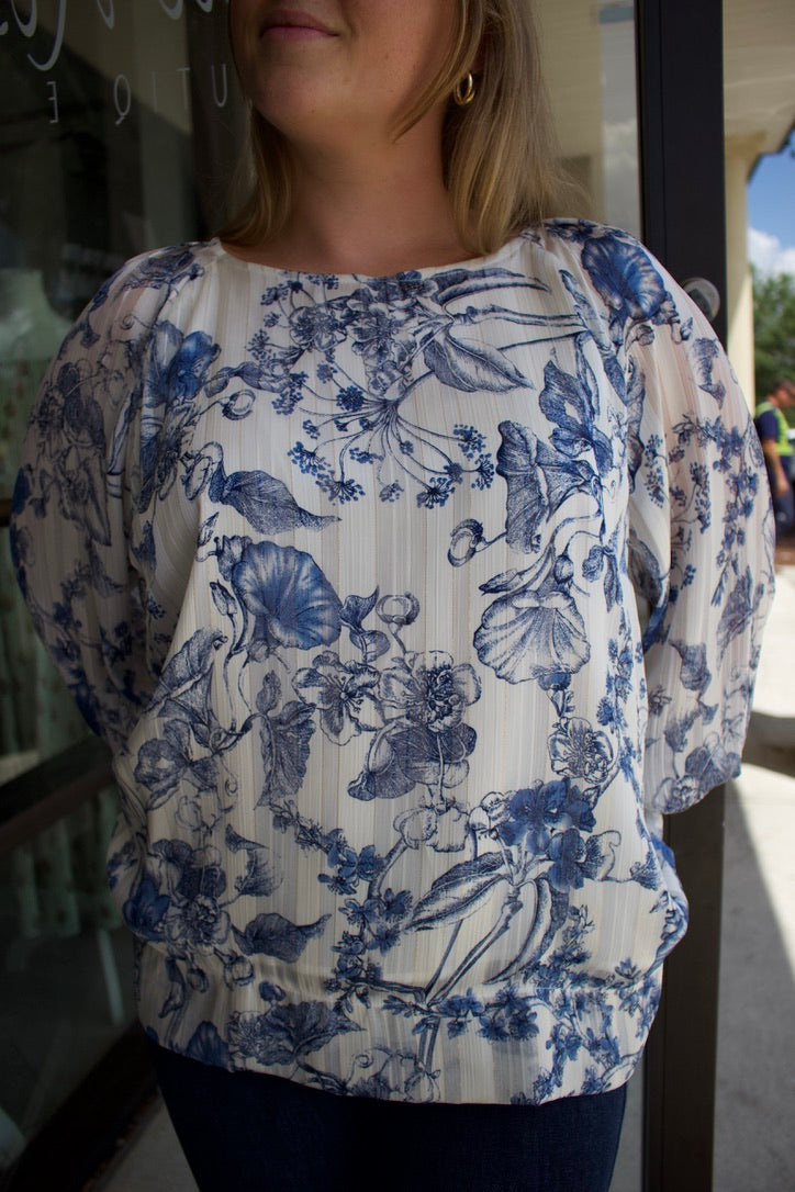blue and white longsleeve floral blouse