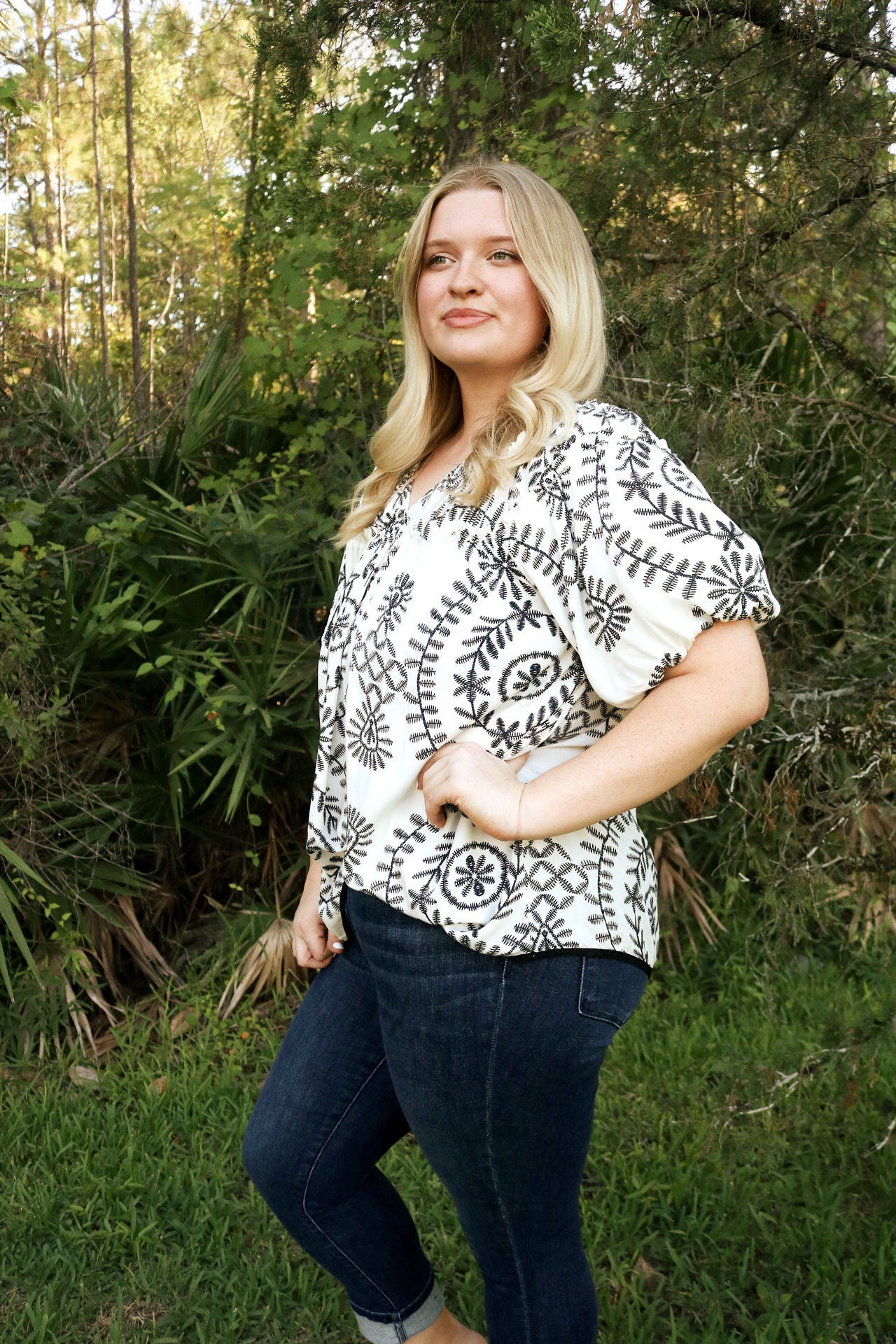 black and white patterned blouse with balloon sleeves