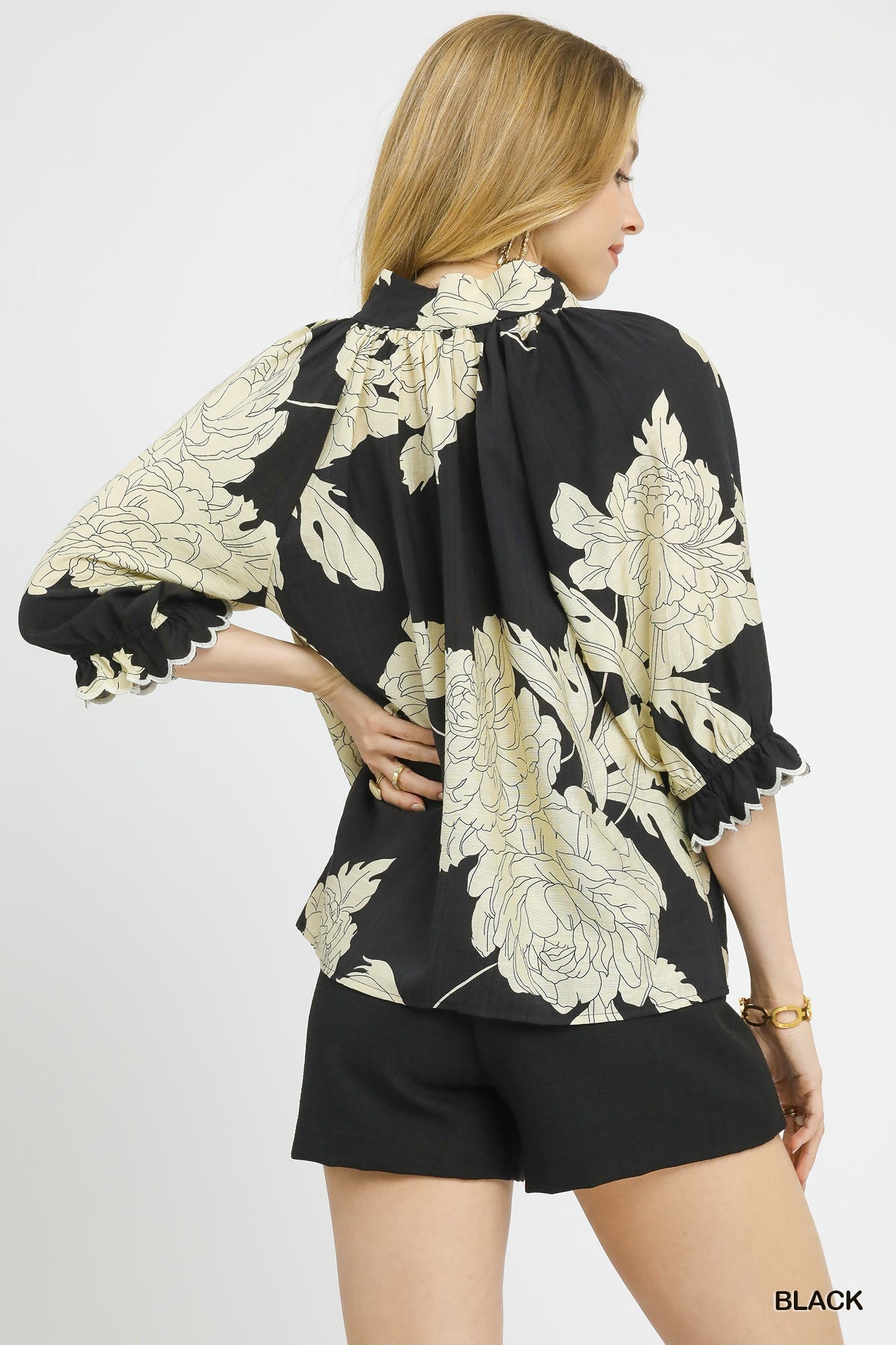 Light, breezy floral black 3/4 sleeve top black