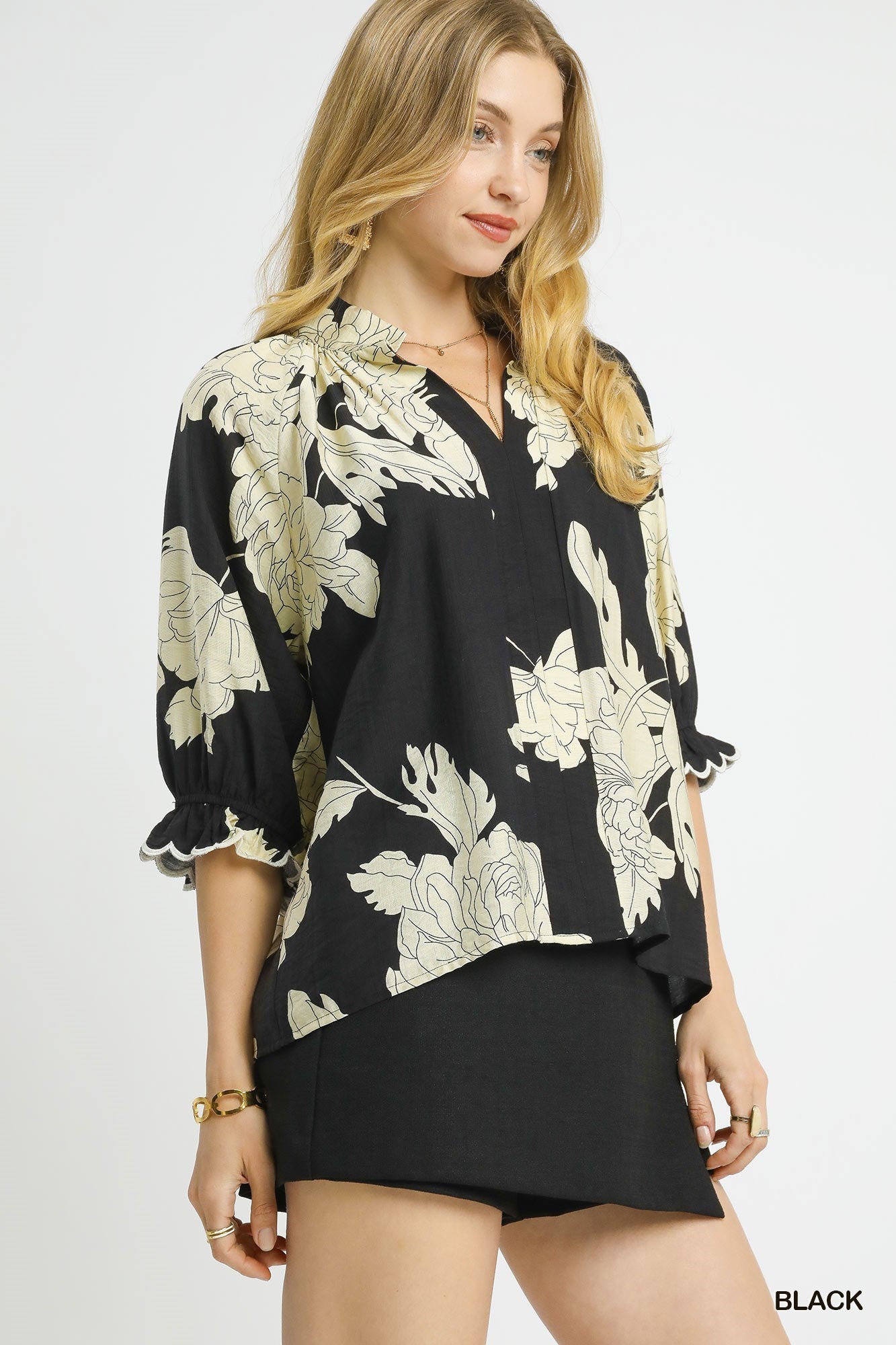 Light, breezy floral black 3/4 sleeve top black
