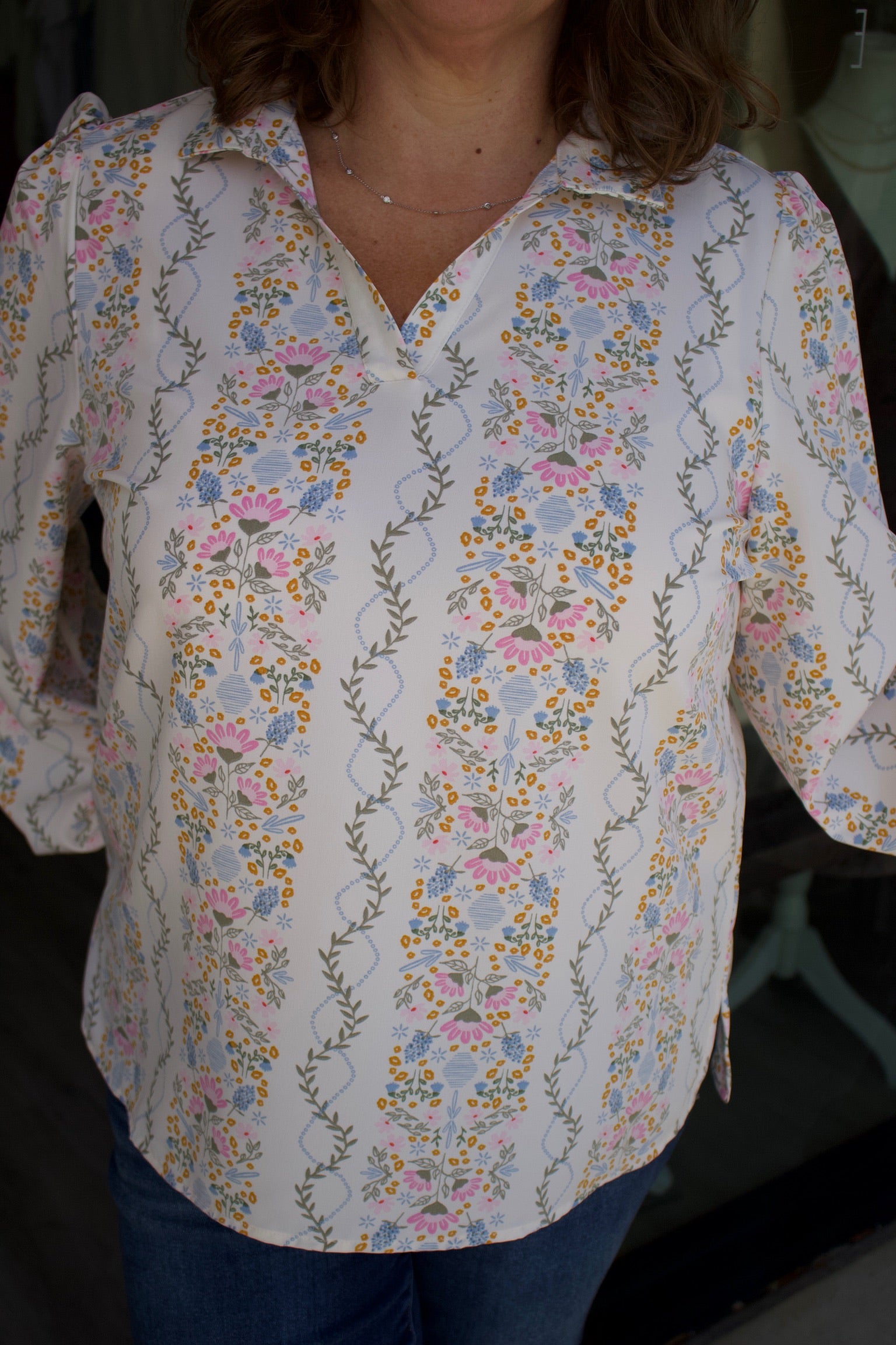 white longsleeve floral blouse