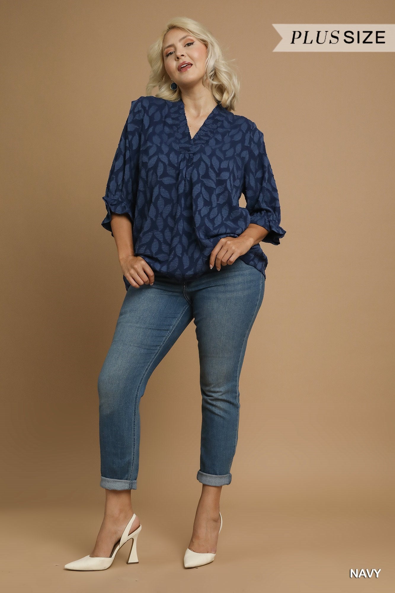 navy blue patterned blouse with v neck