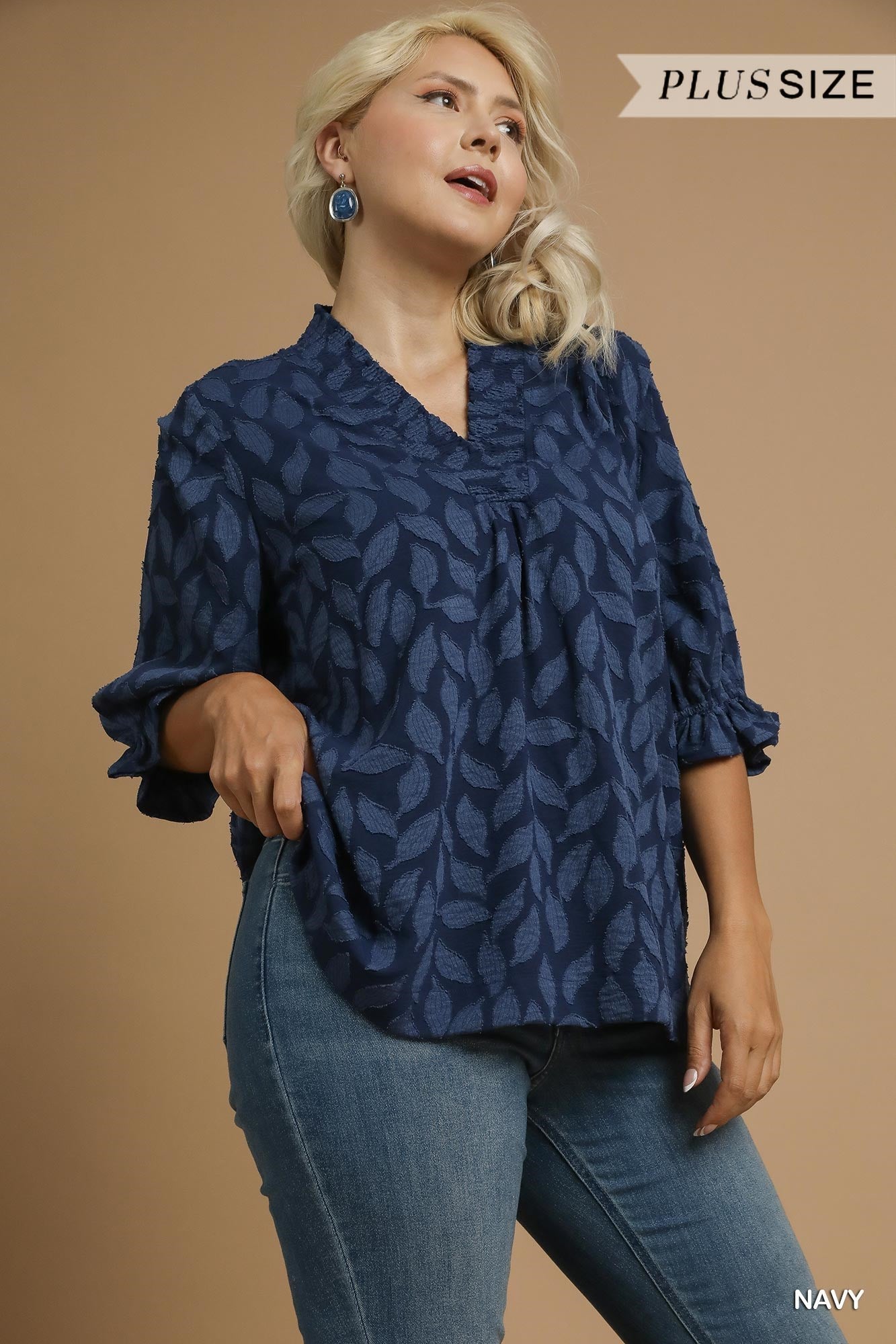 navy blue patterned blouse with v neck