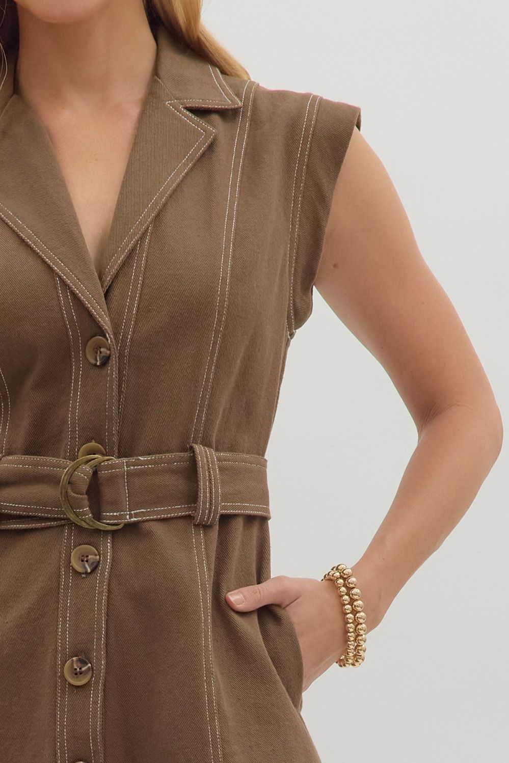 brown sleeveless mini dress with buttons down front and belt
