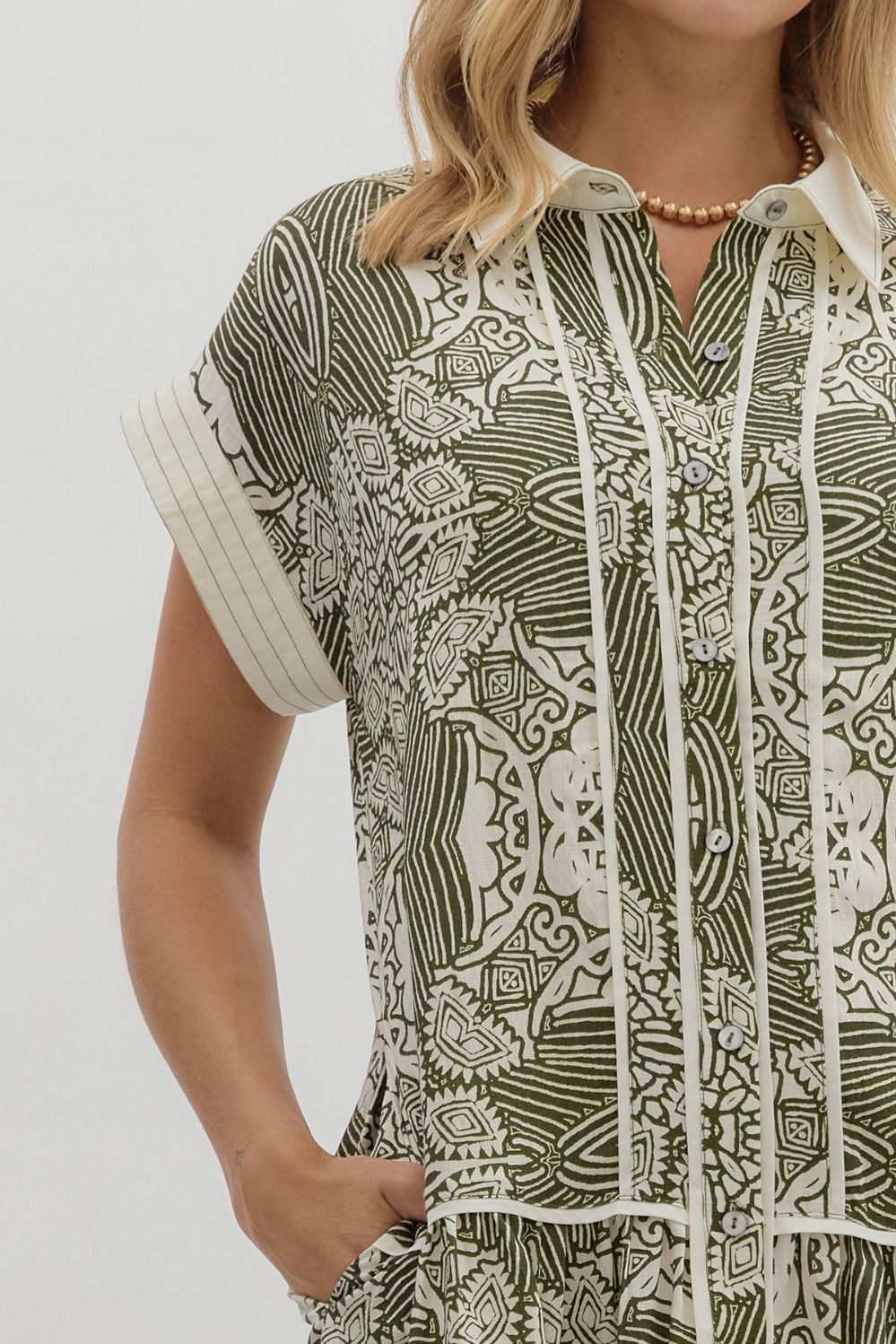 olive and cream patterned dress