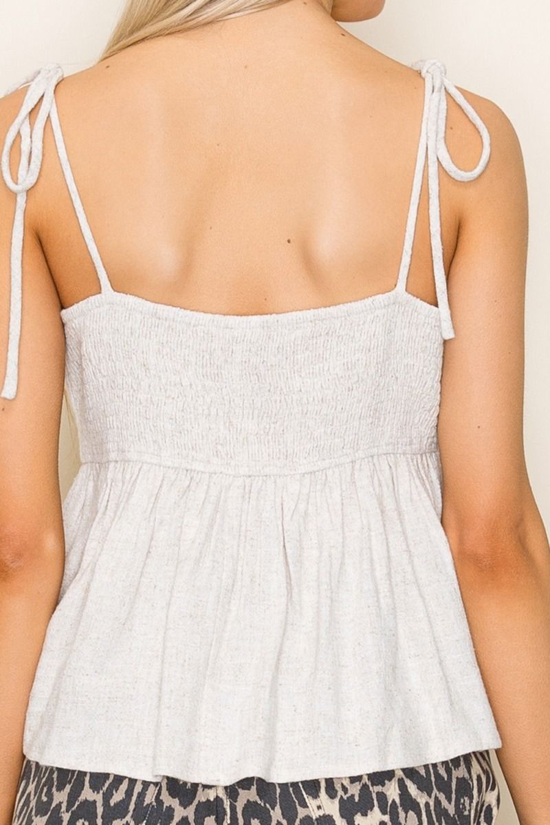 soft, lightweight knit, this breezy top features dainty tie straps, a flattering square neckline