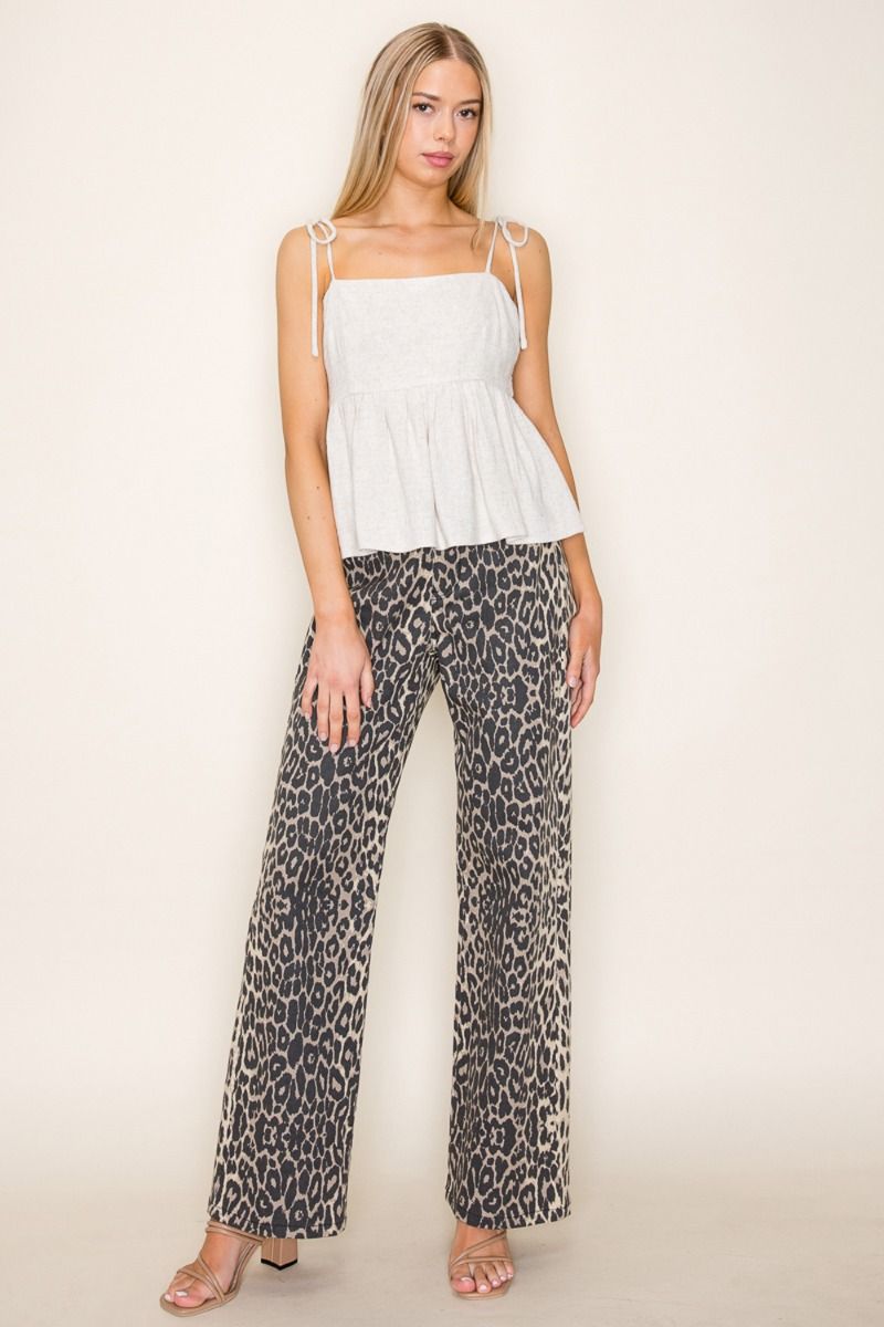 soft, lightweight knit, this breezy top features dainty tie straps, a flattering square neckline