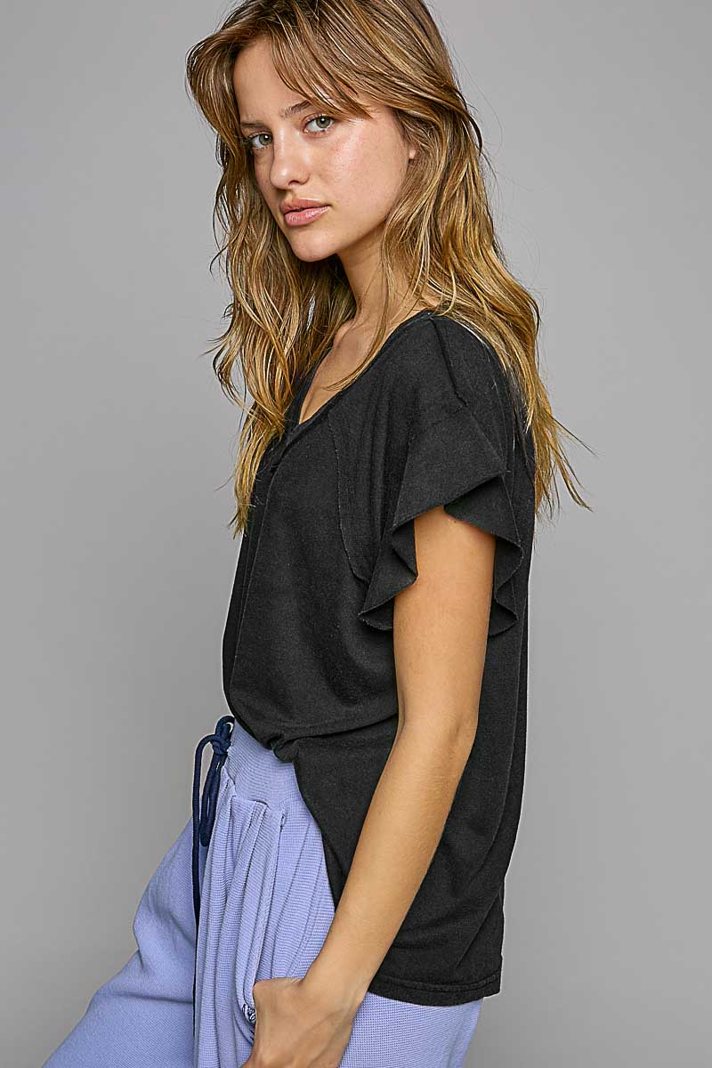 black top with ruffle sleeves