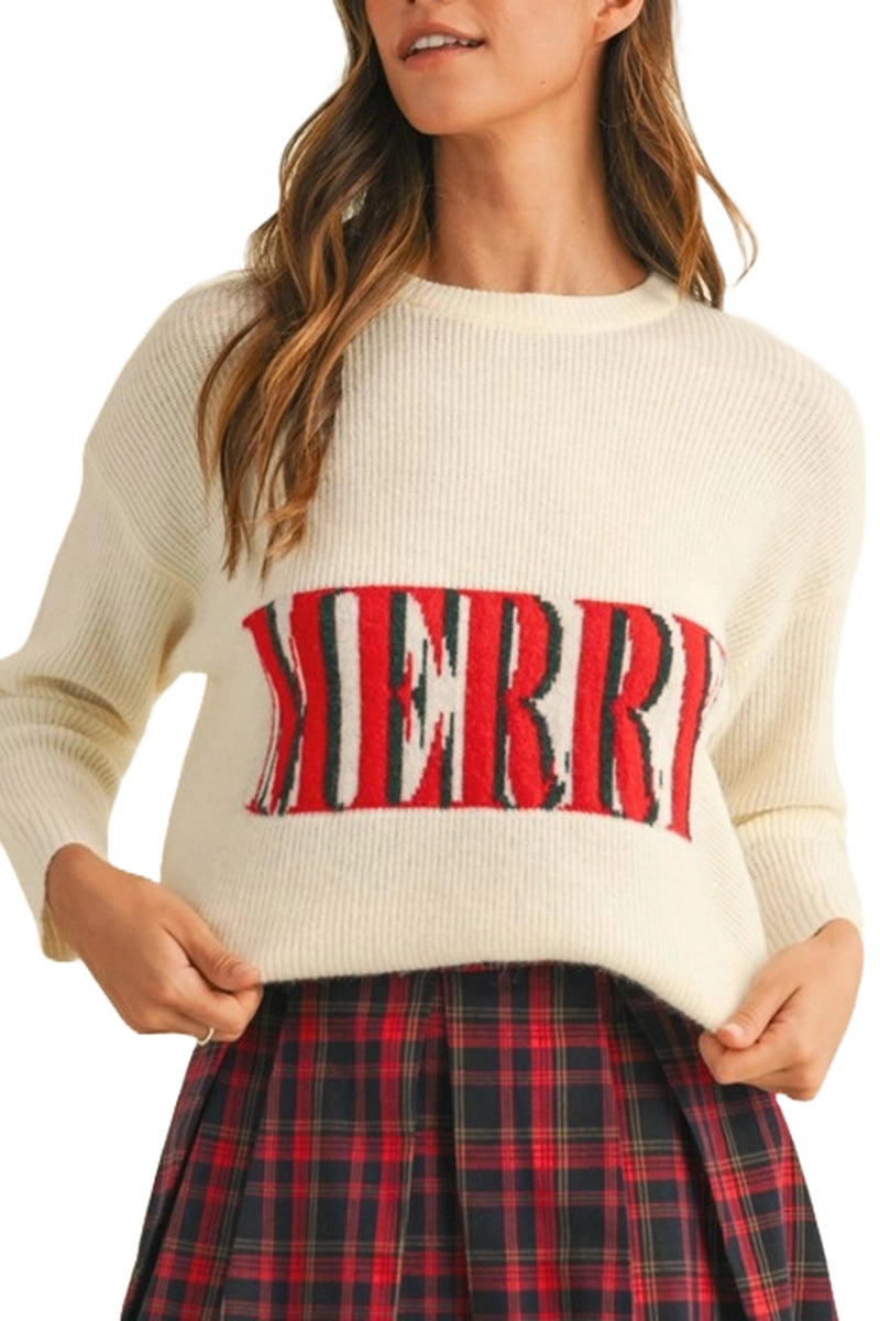 cream sweater with "merry" written on front in red 