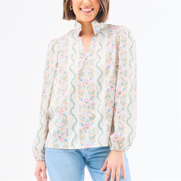 cream colored floral blouse with longsleeves 