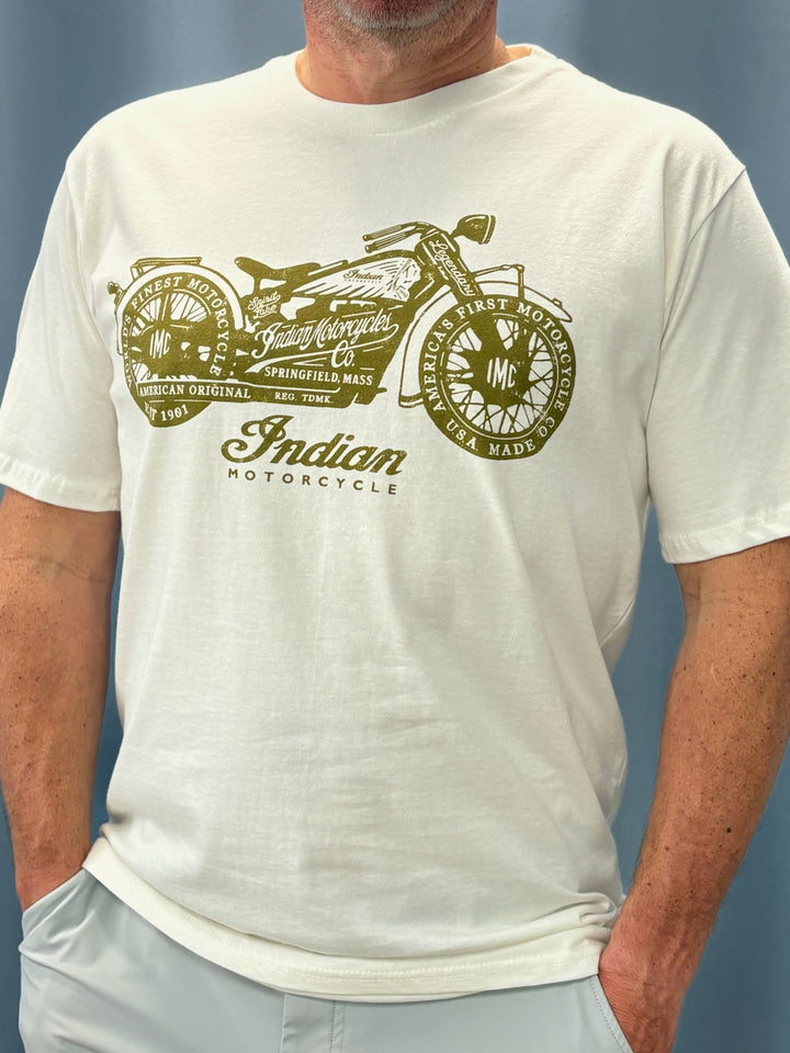 Person wearing a white t-shirt with an Indian Motorcycle graphic on a blue background