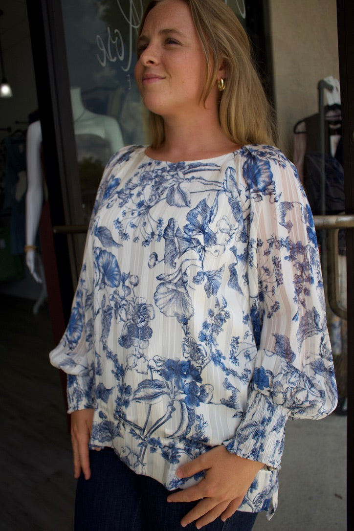 blue and white longsleeve floral blouse 