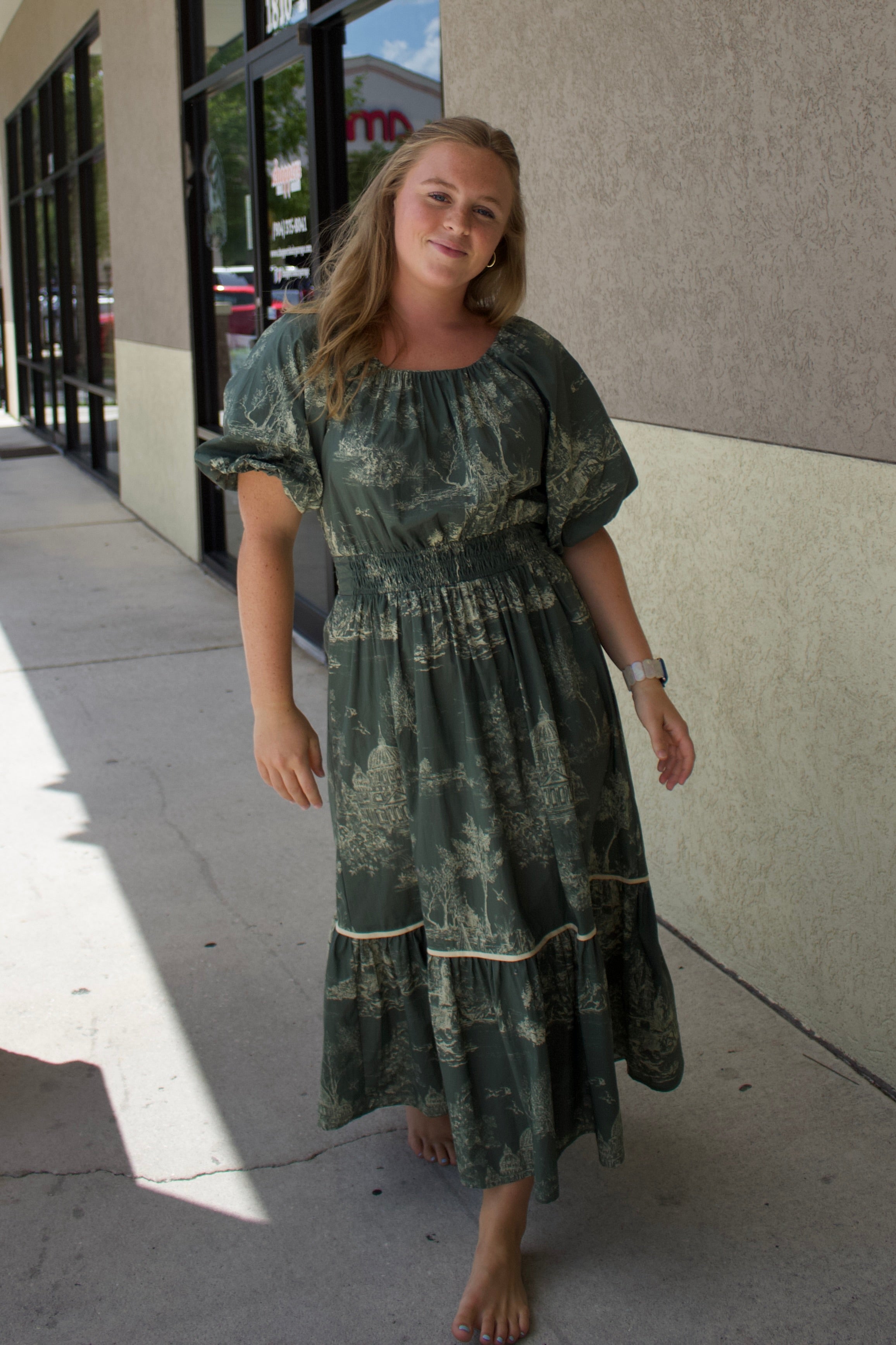 long green dress with puff sleeves