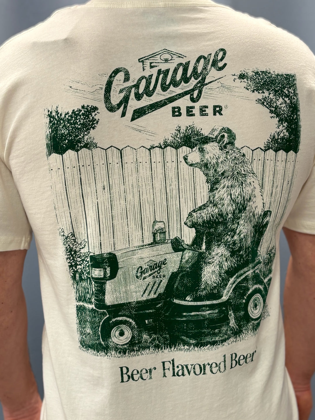 T-shirt with a bear driving a tractor and &