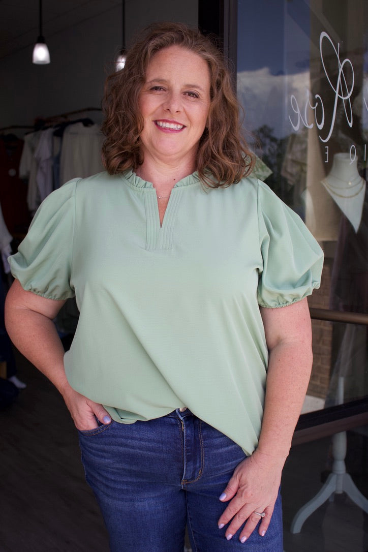 light green blouse with puff sleeve