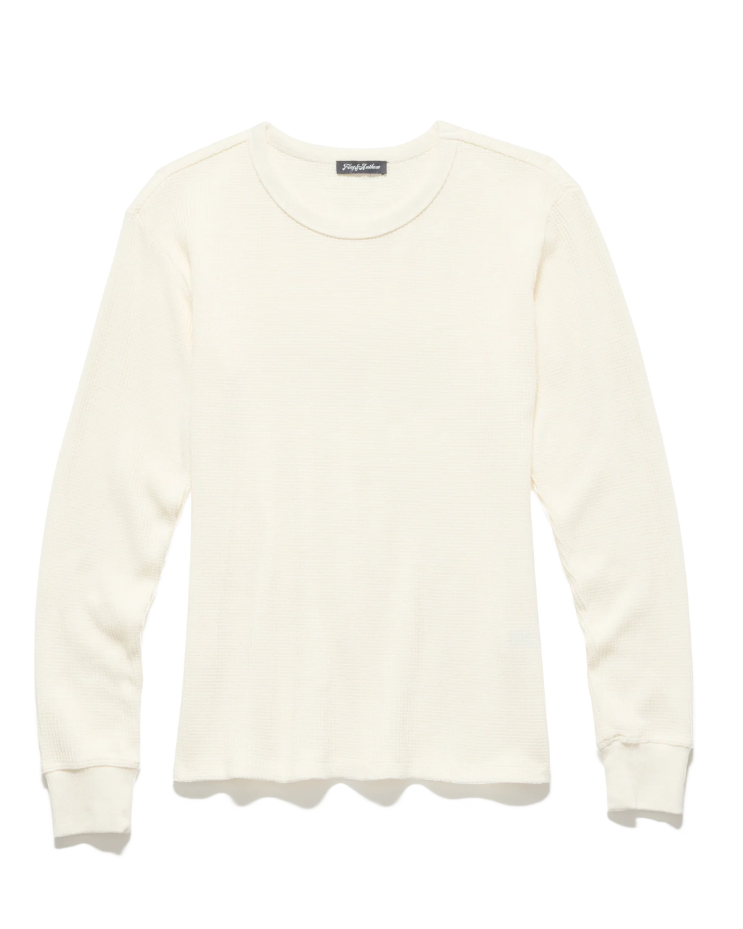 White sweater with a brand label on a white background