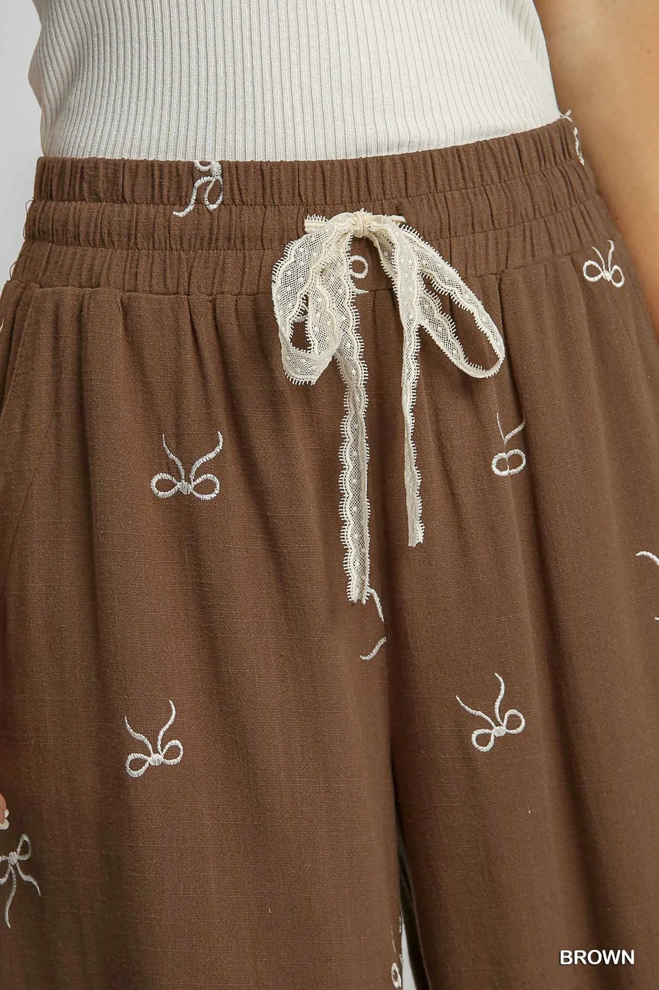 brown linen pull on pants with bows 