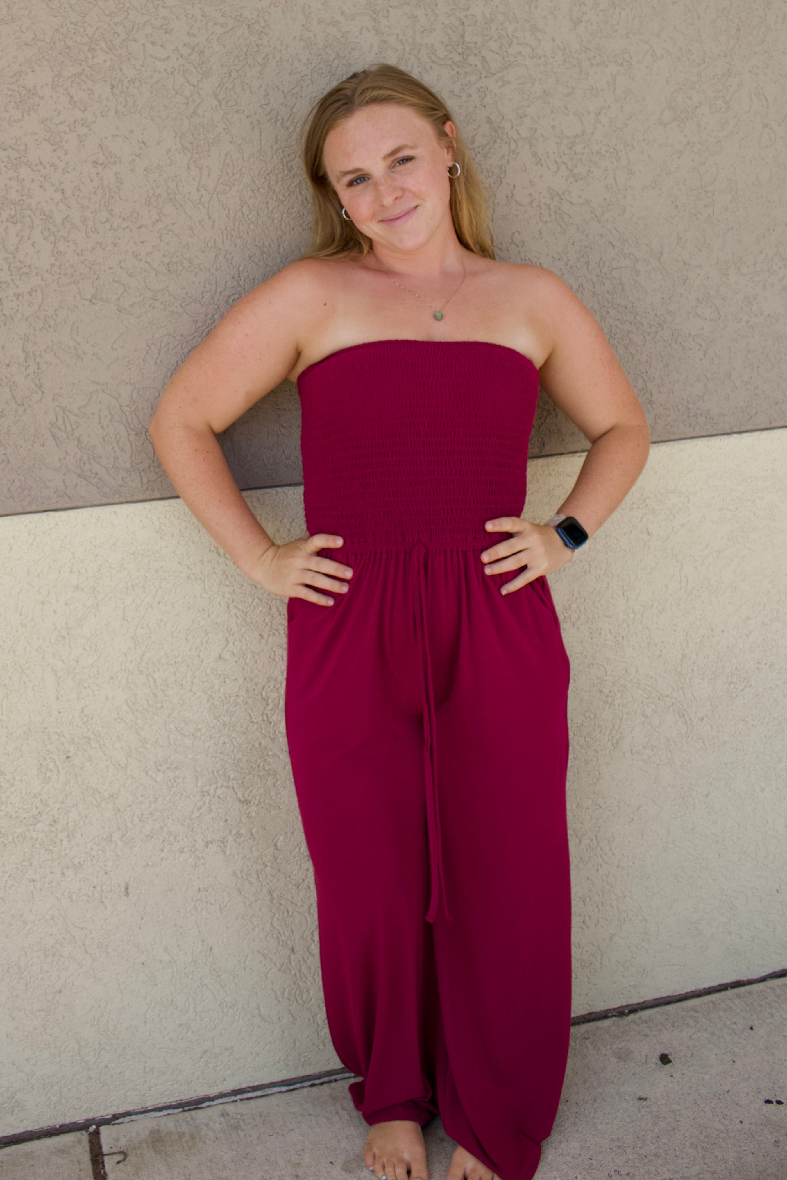 red strapless smocked tube top jumpsuit 