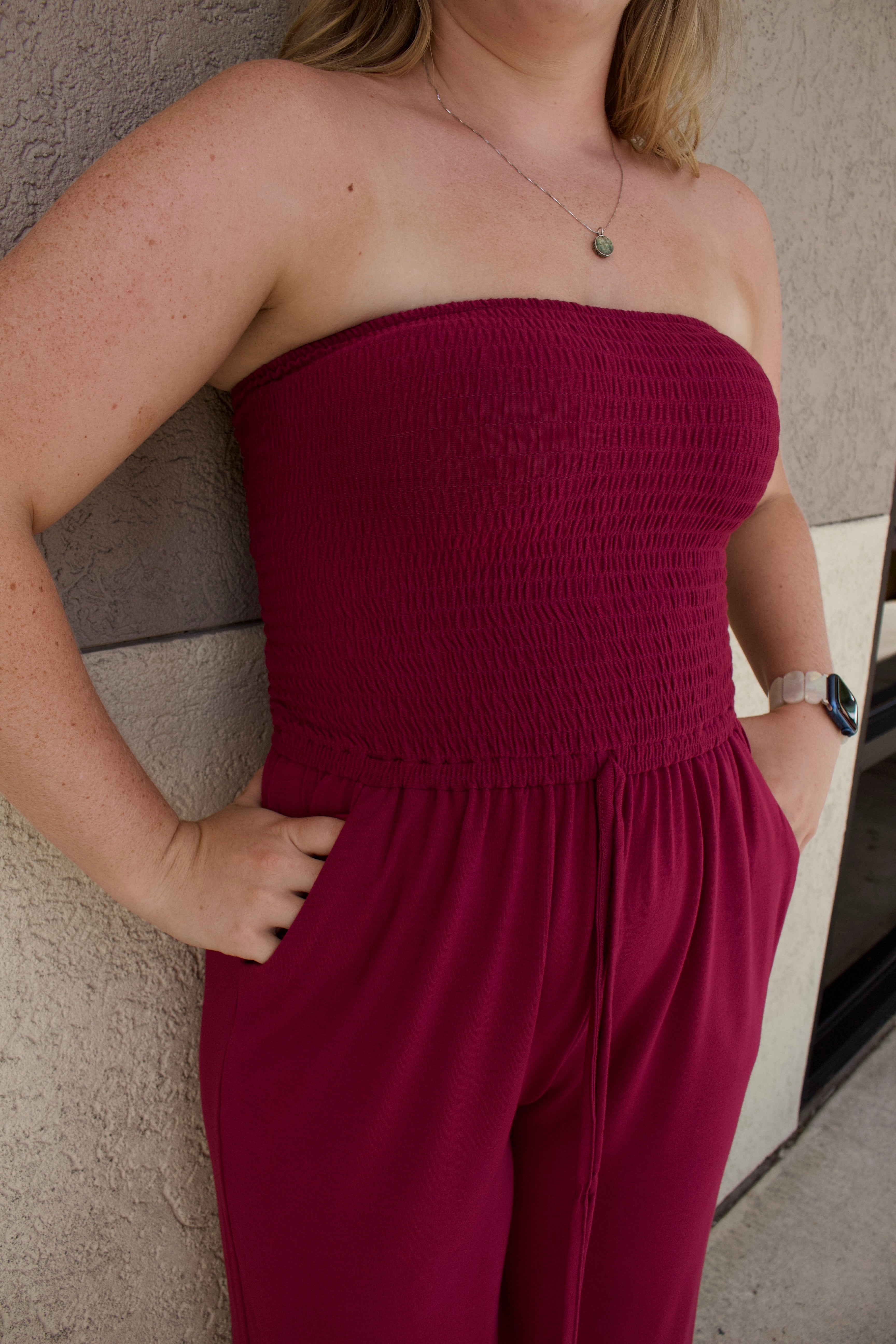 red strapless smocked tube top jumpsuit 