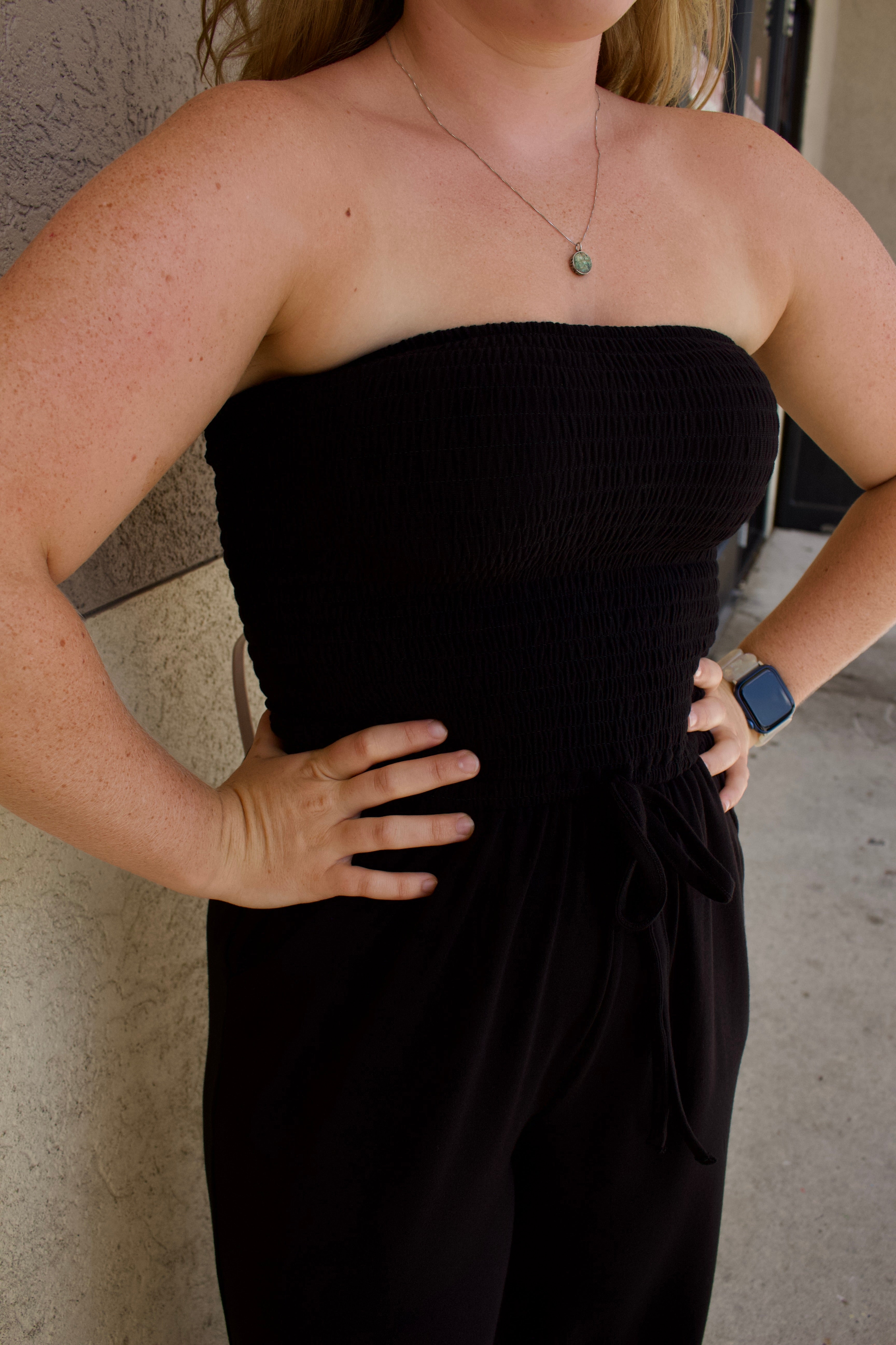 black strapless smocked tube top jumpsuit 