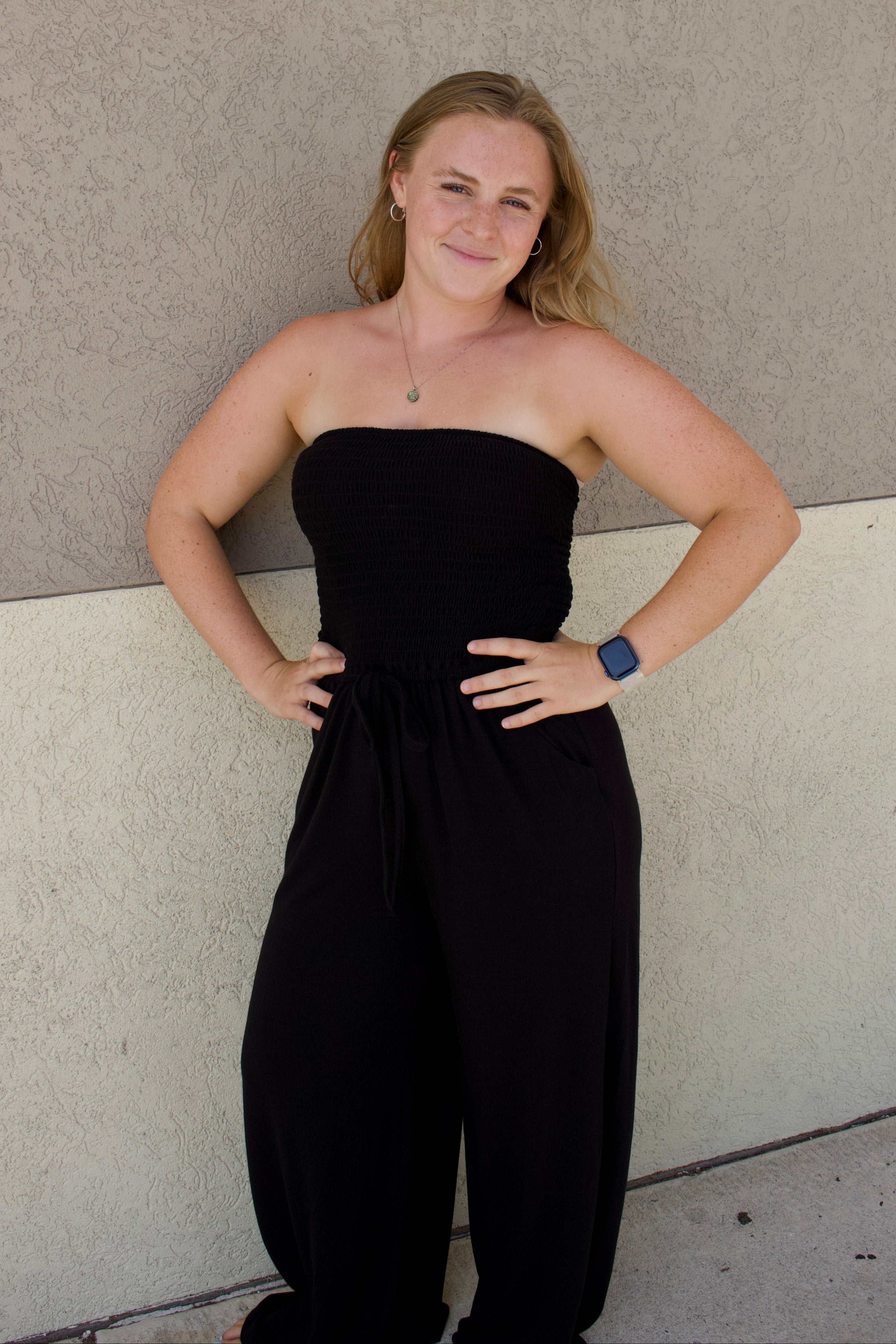 black strapless smocked tube top jumpsuit 