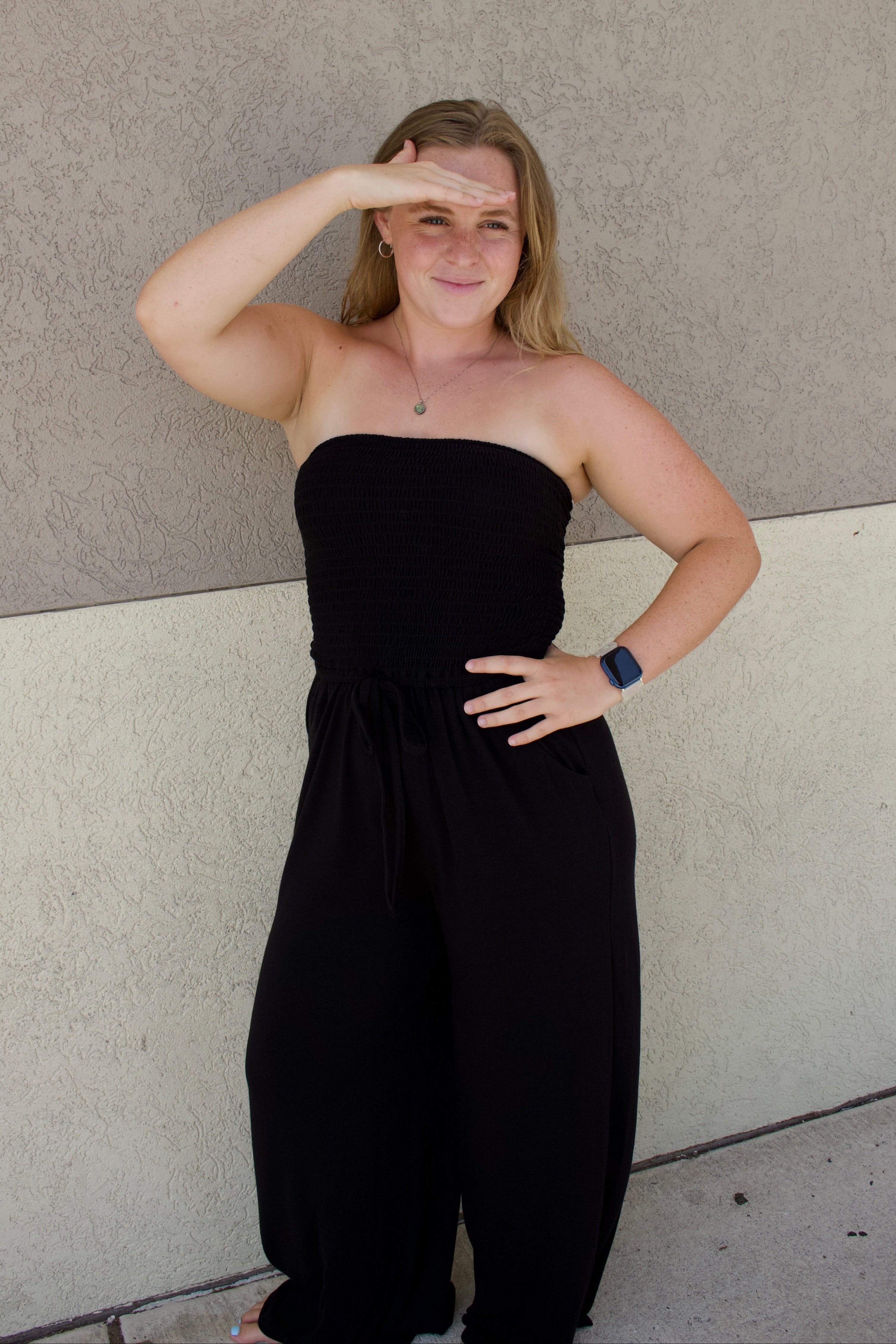 black strapless smocked tube top jumpsuit 
